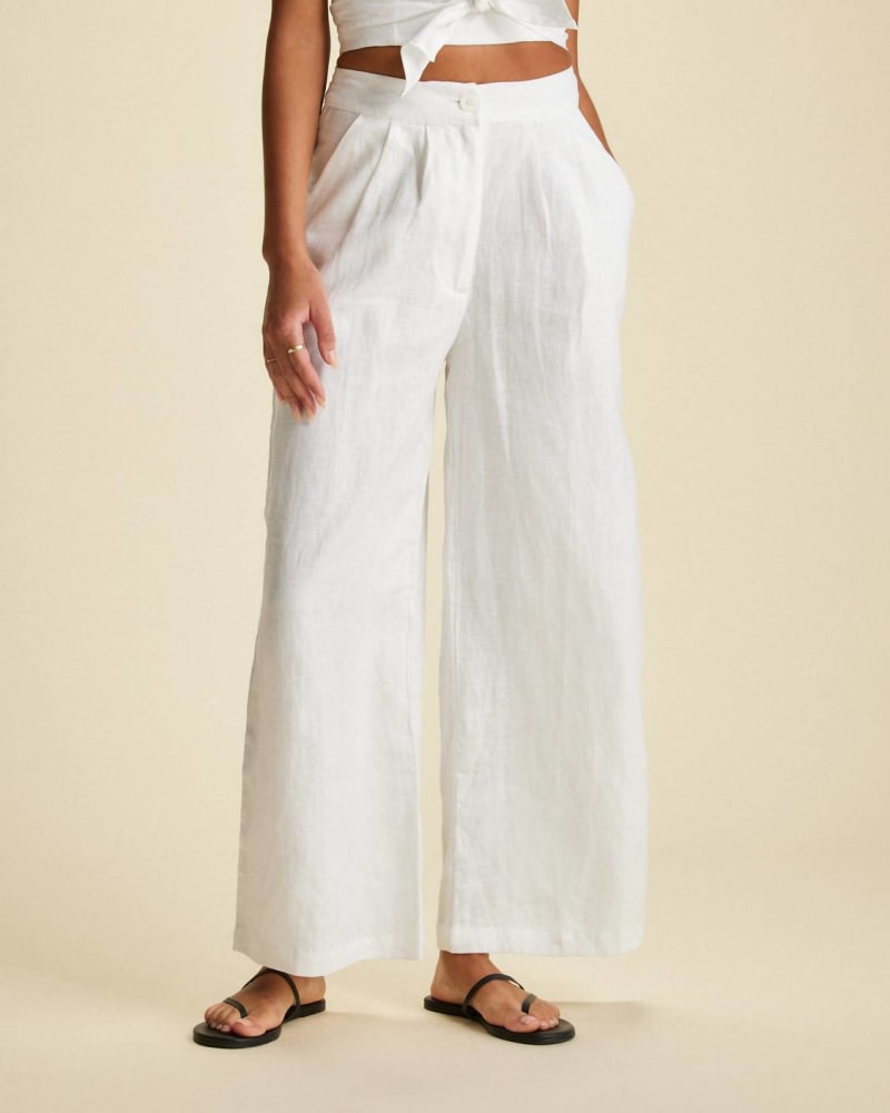 Front of a model wearing a size L Circa Pant in White in White by FAITHFULL THE BRAND. | dia_product_style_image_id:343250